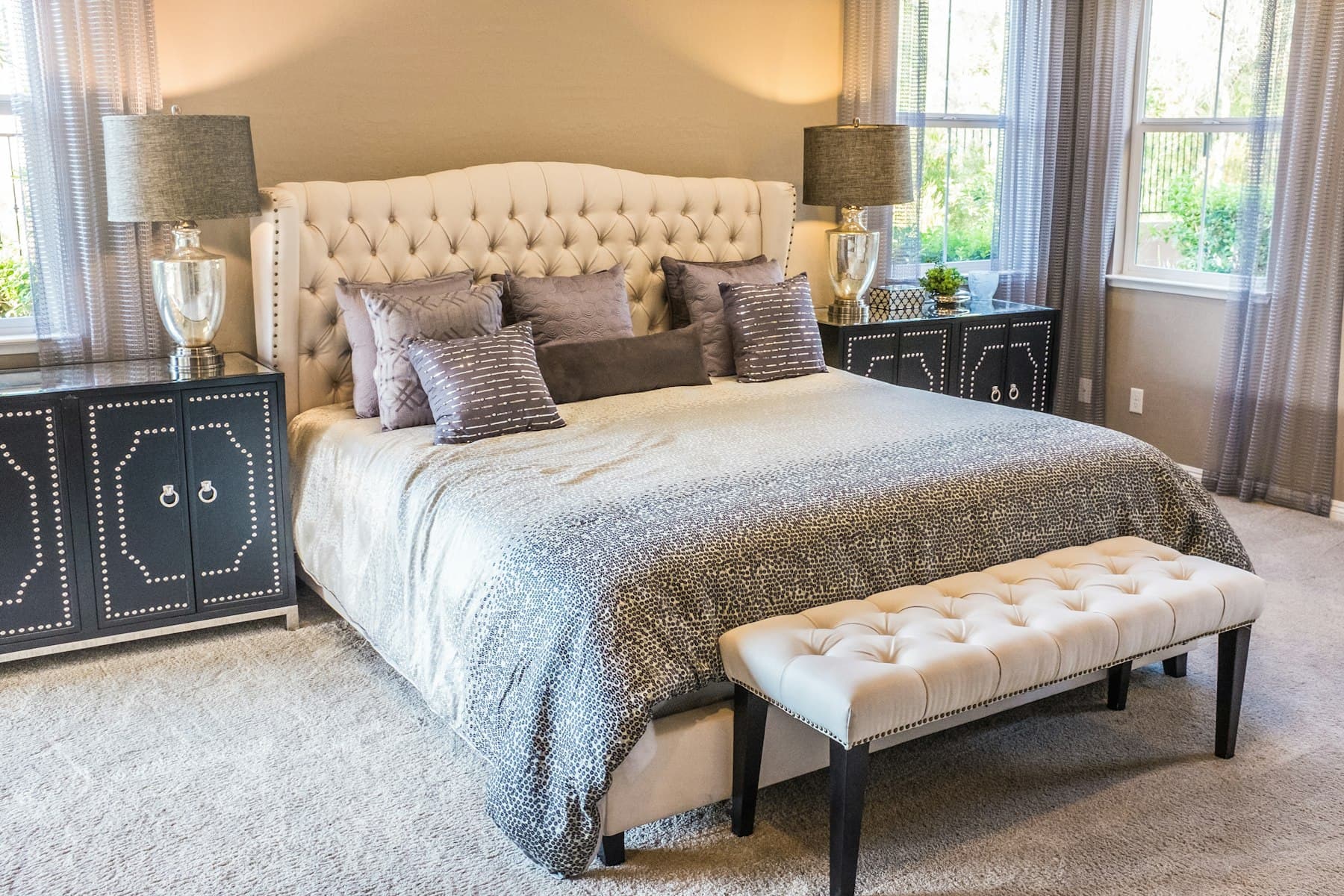 A dressed bed in a calm bedroom, the setting for mattress cleaning